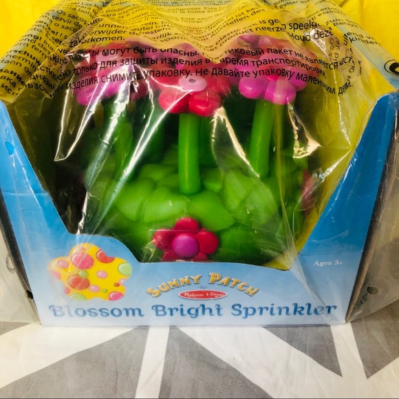 melissa & doug sunny patch blossom bright sprinkler